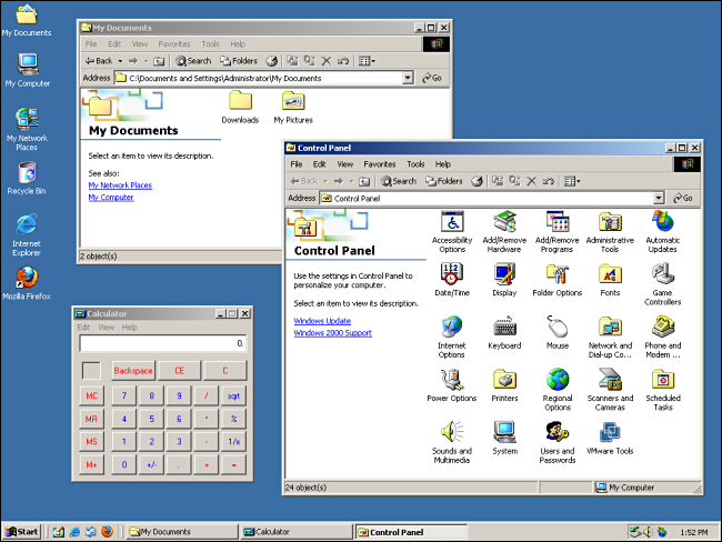 "My Documents," "Control Panel," and "Calculator" opened on a Windows 2000 desktop.