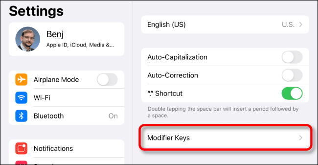 Tap "Modifier Keys" in iPad Keyboard Settings.