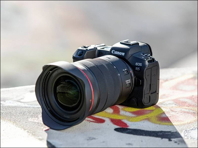The Canon EOS R5 with a long lens attached.